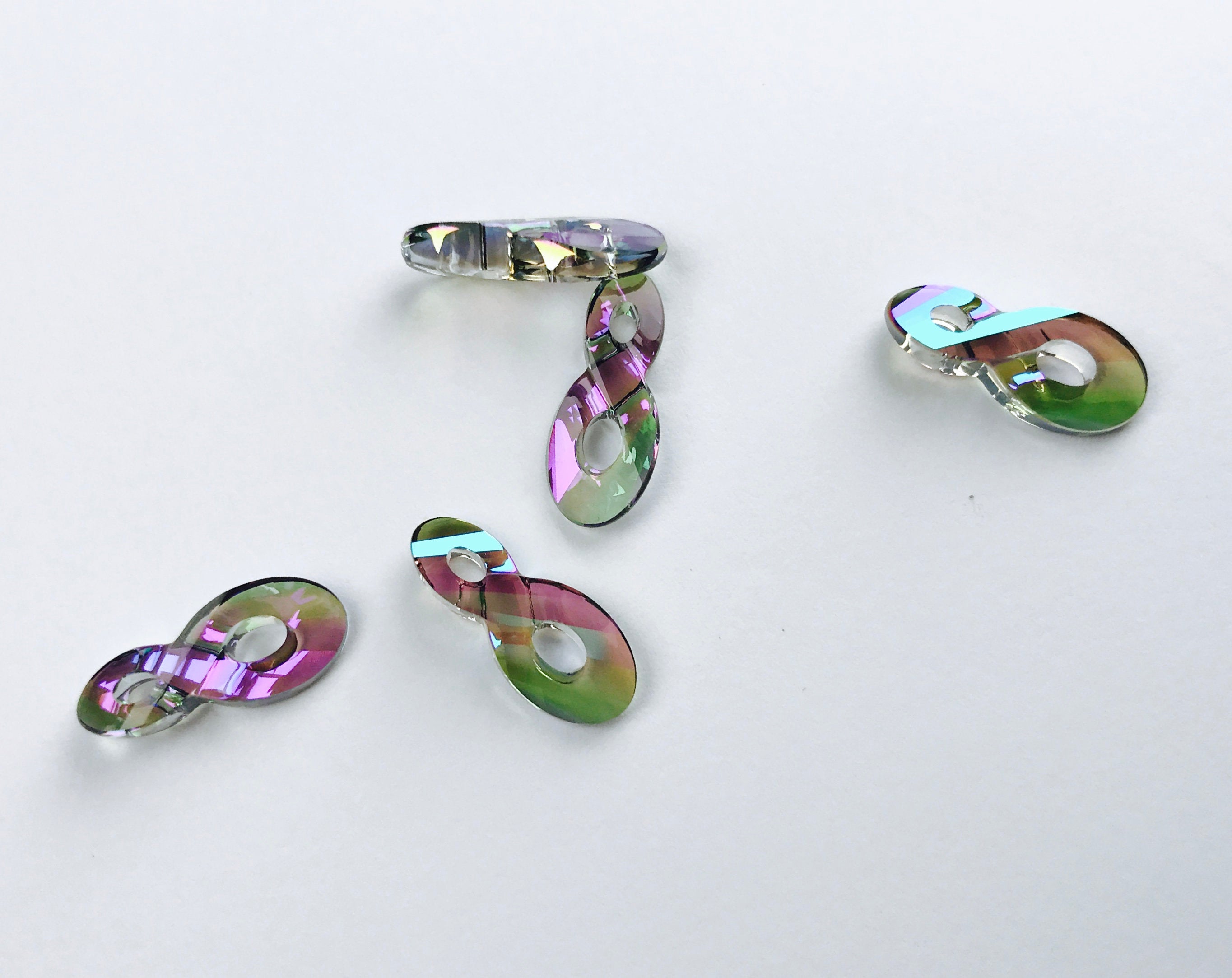 1pc, 18mm, Genuine Swarovski Infinity Pendant In Crystal Paradise Shine
